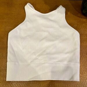 It’s a racer back that is off white and ribbed